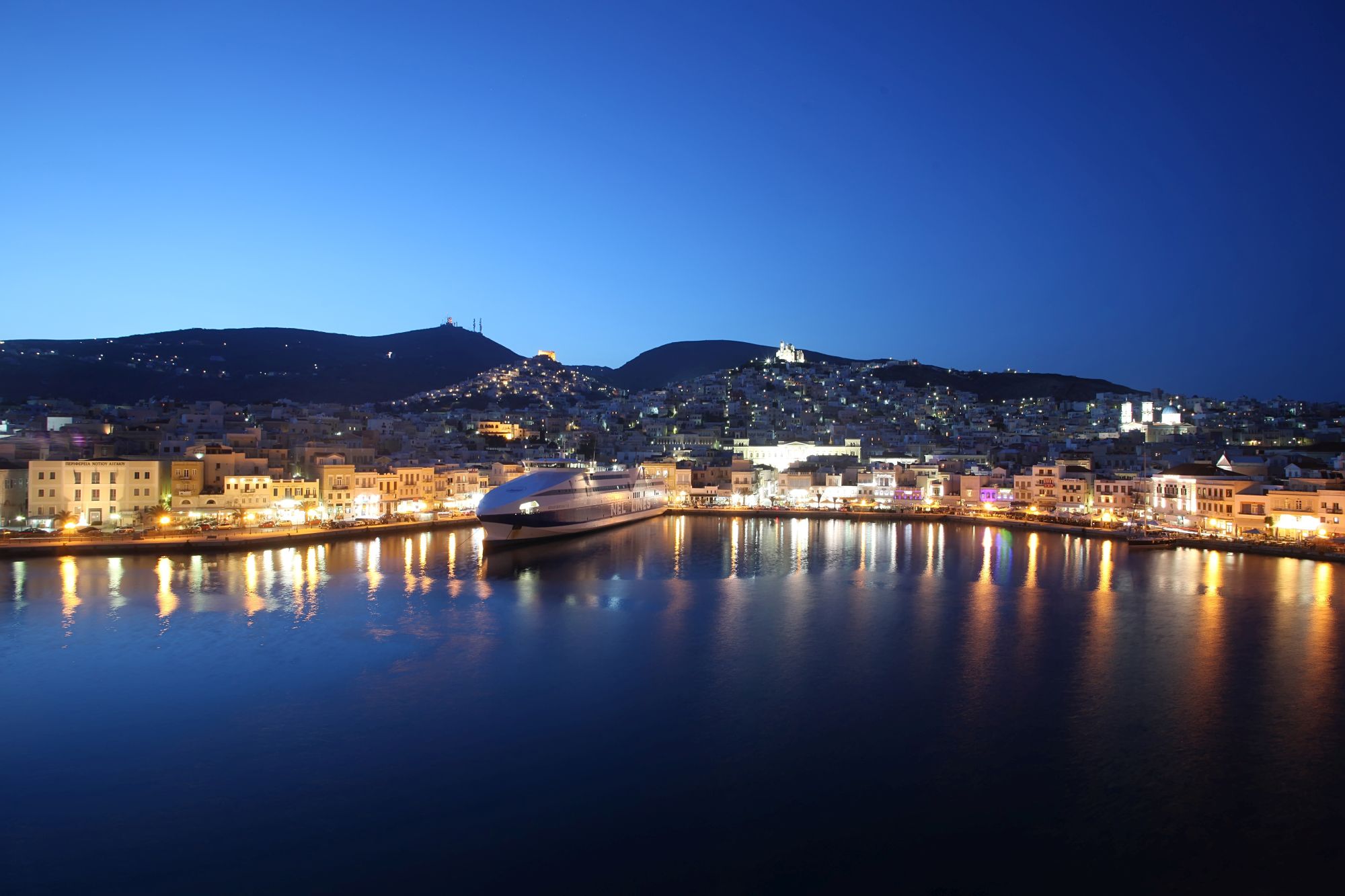 Hermoupolis port by night.