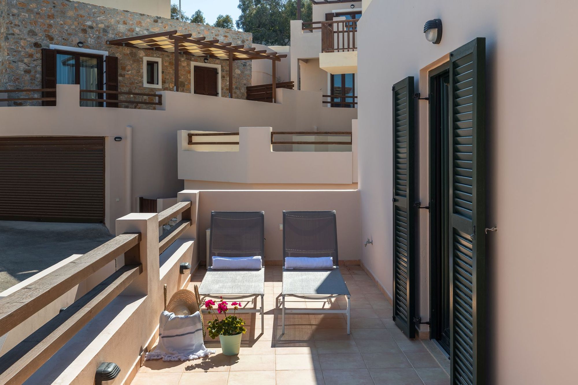 Veranda with two sunbeds.